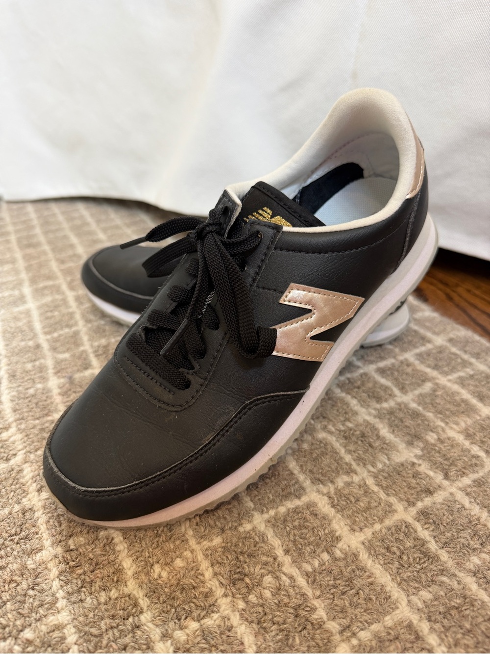 New Balance Black Sneakers with Rose Gold 'N' Accent